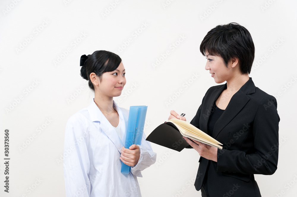 doctor and businesswoman talking doctor and businesswoman talking