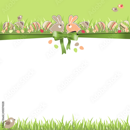 Easter greeting card with eggs, rabbits and grass
