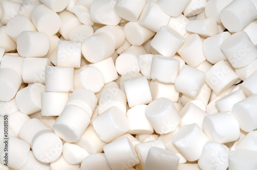 White salt tablets for water softening closeup.