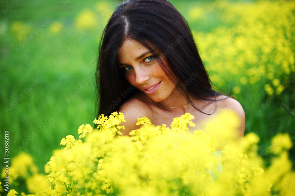 woman on oilseed field woman on oilseed field