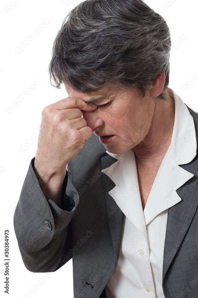 woman with headache pinching her nose isolated woman with headache pinching her nose isolated