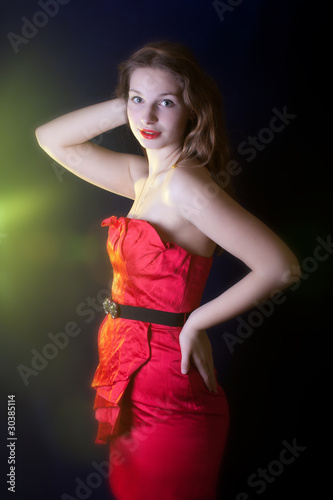Beautiful girl portrait with retro hat in yellow light