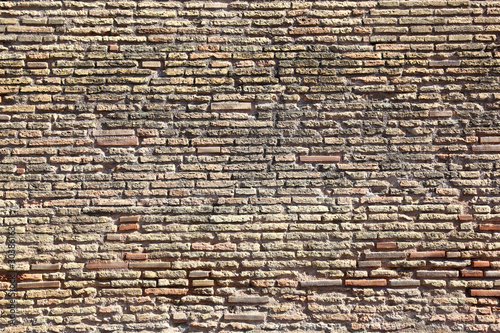 old, bright, yellow brick Vatican walls.