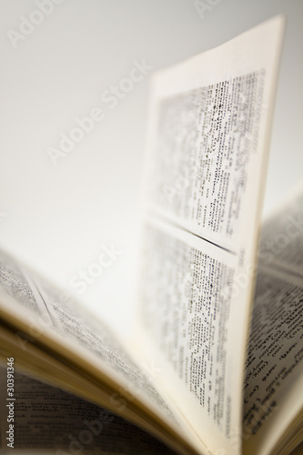 Open book on white background