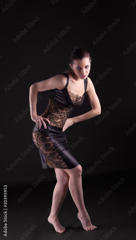 woman in lacy dress walk on tiptoe