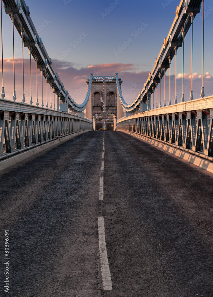 Fototapeta premium Sunset over the Menai Bridge in Wales
