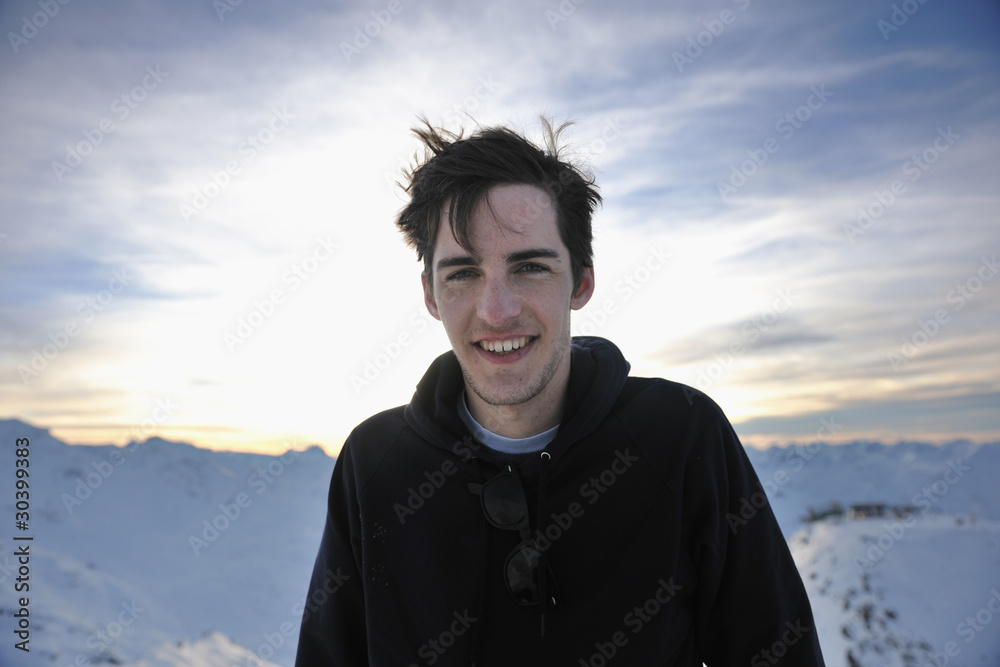 happy young man have fun at winter on mountain peak happy young man have fun at winter on mountain peak