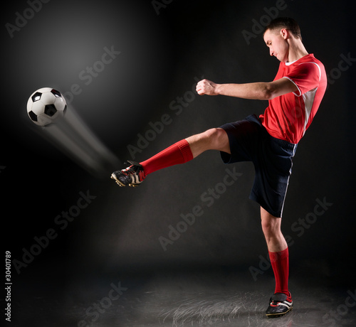 soccer player strikes