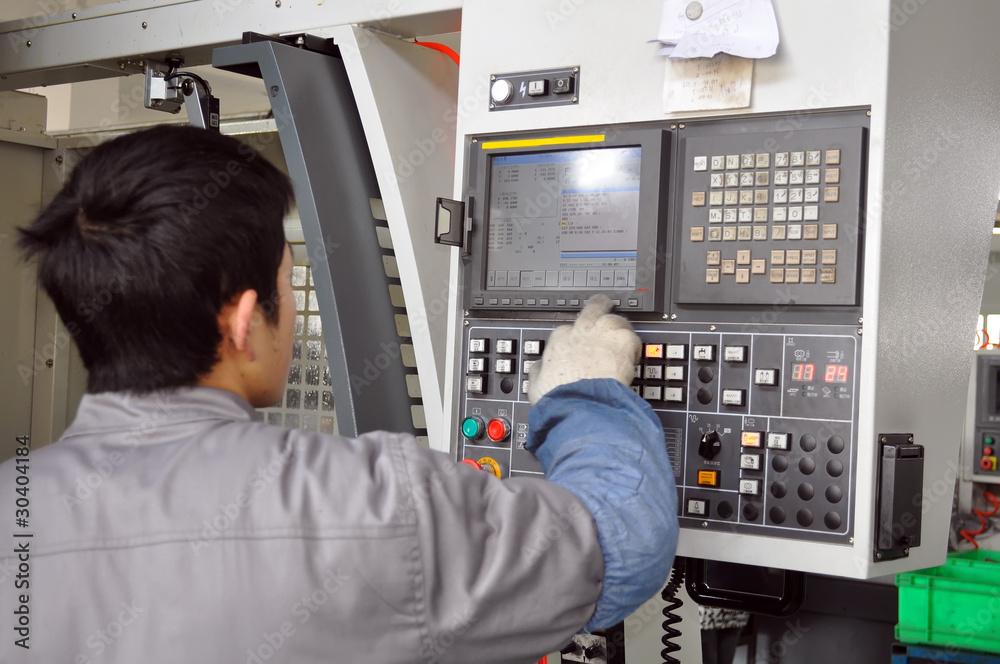 workers control CNC