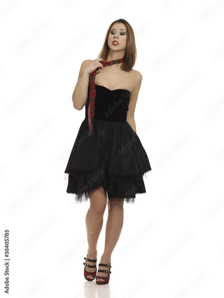 girl in little black dress looking displeased