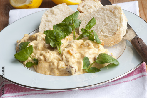 Coronation chicken with watercress and baguette