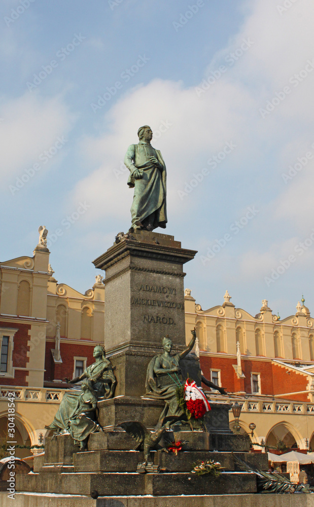 Obraz premium Adam Mickiewicz Monument in Front of the Cloth House