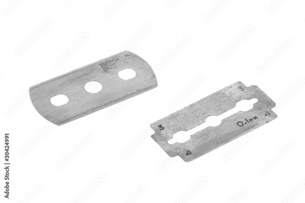 Old traditional razor blade, isolated on white background Old traditional razor blade, isolated on white background