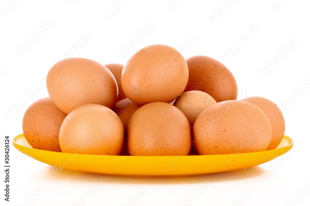 Eggs in plate isolated on white Eggs in plate isolated on white