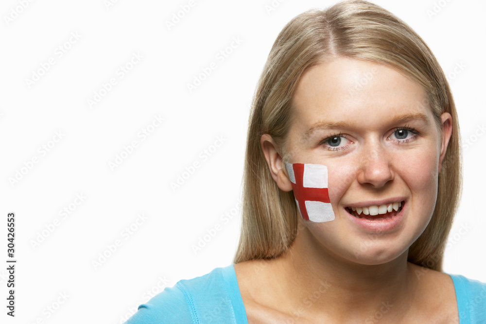 Young Female Sports Fan With St Georges Flag Painted On Face Young Female Sports Fan With St Georges Flag Painted On Face