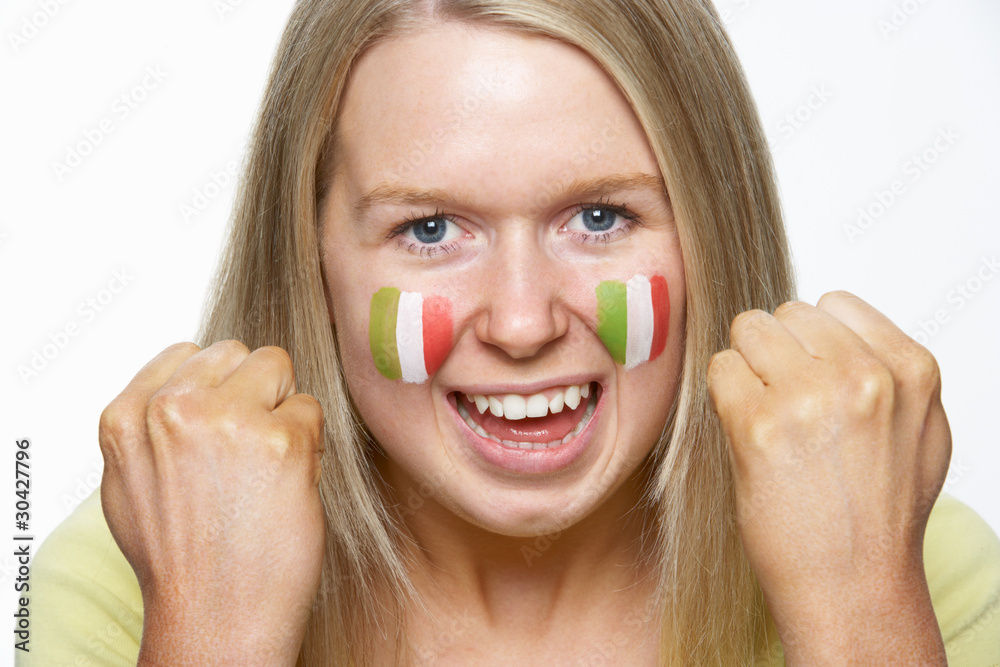 Young Female Sports Fan With Italian Flag Painted On Face