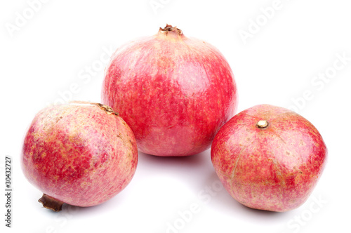 three fresh pomegranate