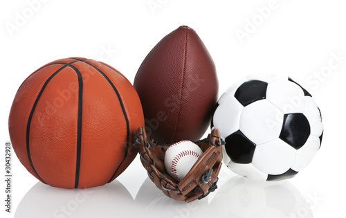 Football, Soccerball, Baseball and Basketball, Isolated, White © mitgirl