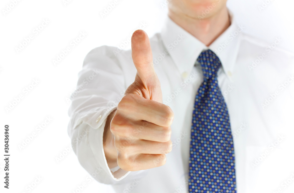 young businessman showing thumb up young businessman showing thumb up