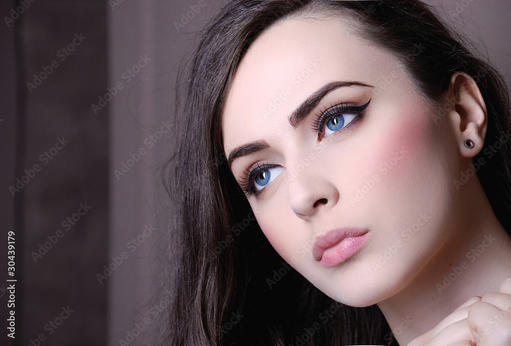 Portrait of young woman with blue eyes Portrait of young woman with blue eyes