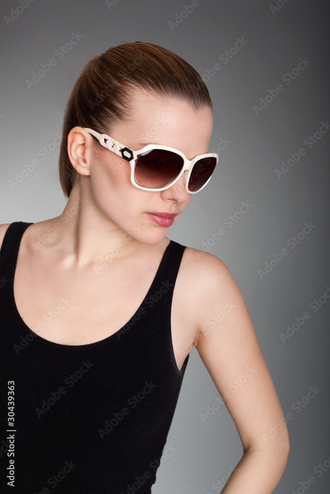 fashionable young woman with sunglasses
