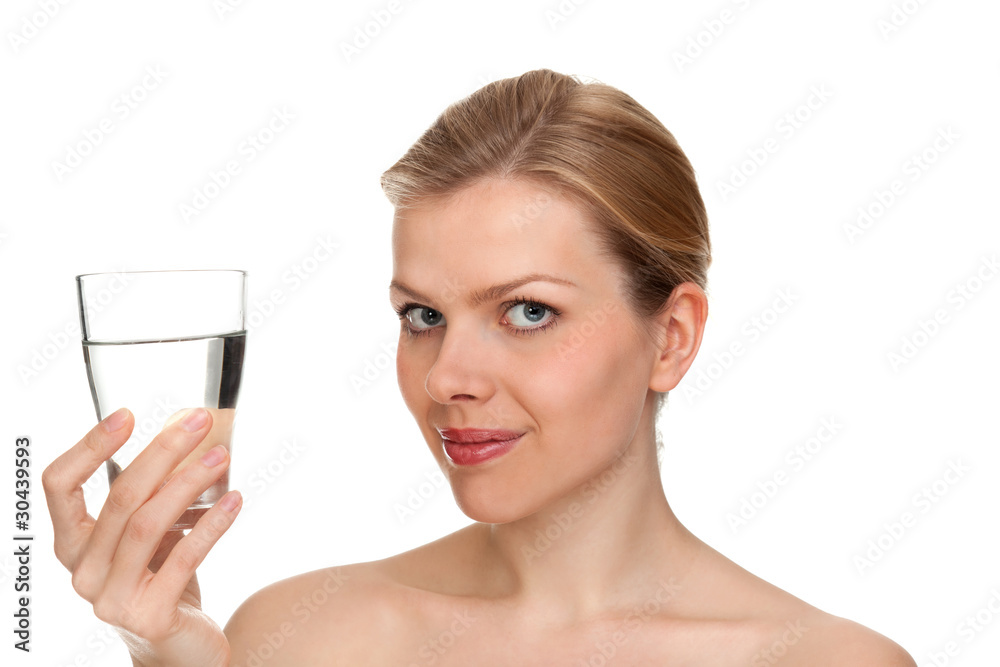 woman holding a glass of fresh water woman holding a glass of fresh water