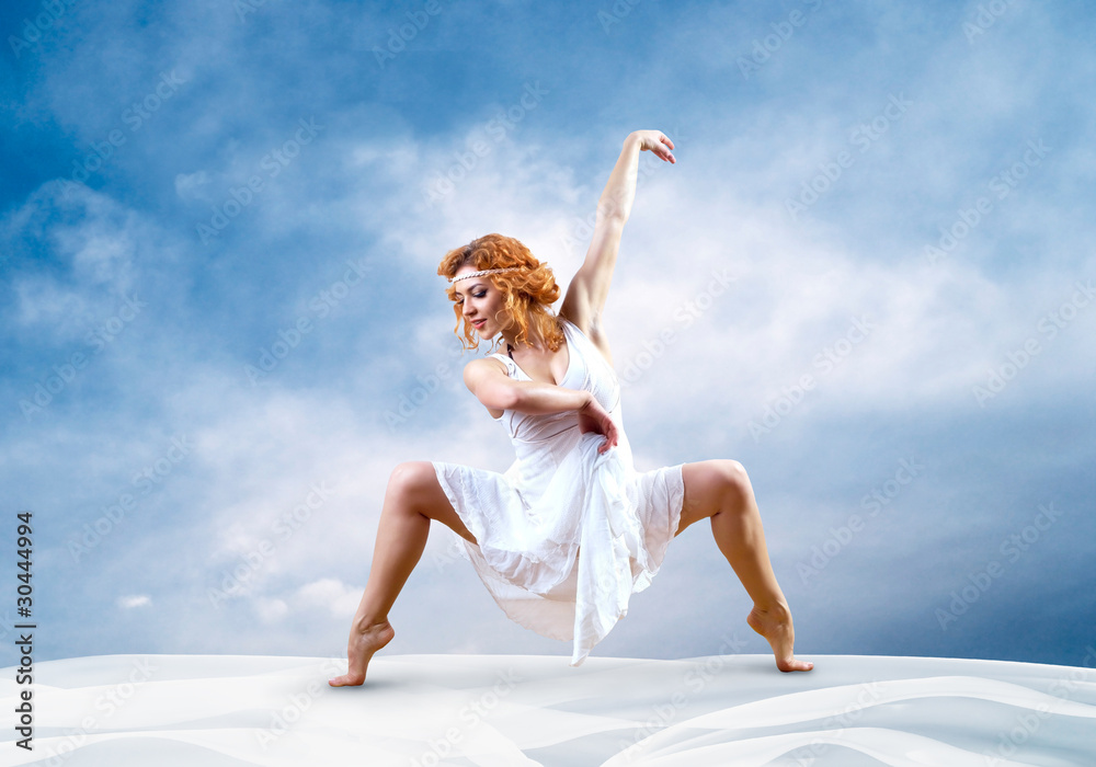Woman dancer jump posing on background Woman dancer jump posing on background