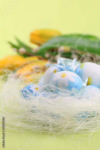 Blue Easter eggs and tulips