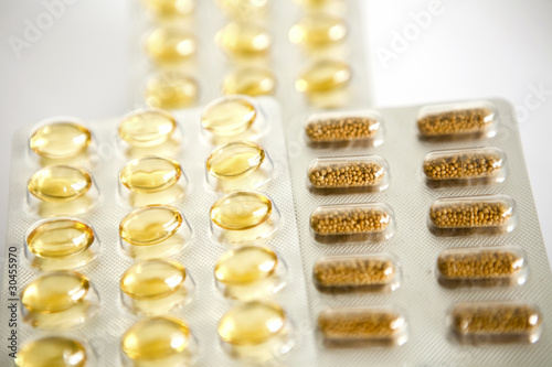 pack of yellow medicine pills