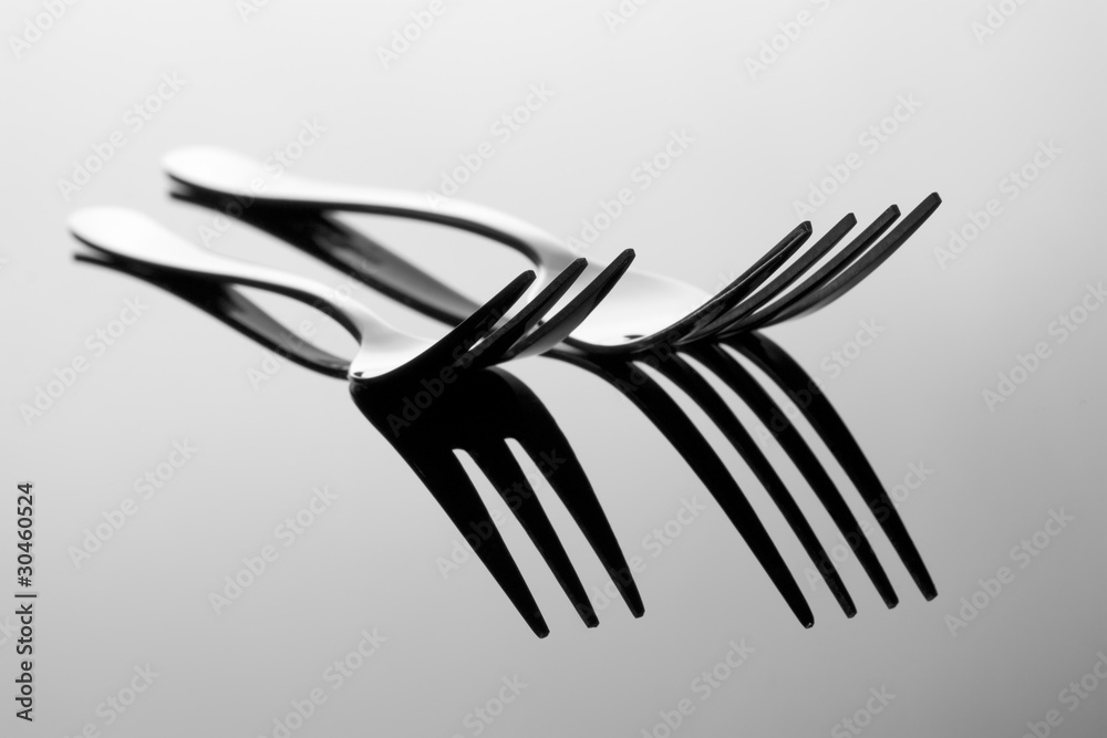 Abstract image for kitchen.Two Forks with reflection. Abstract image for kitchen.Two Forks with reflection.