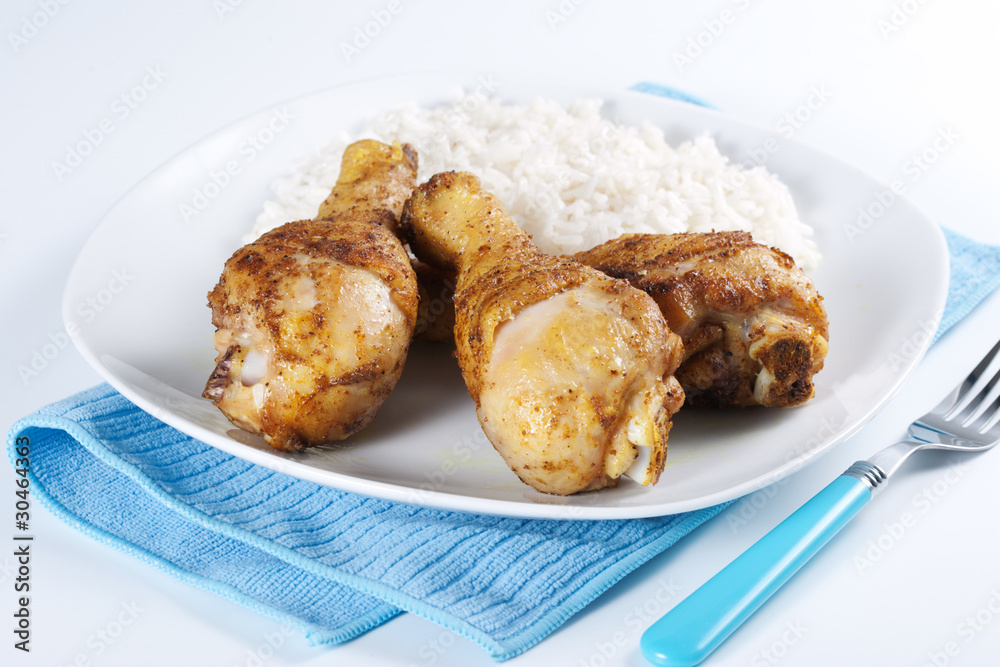 Roasted chicken legs with boiled rice
