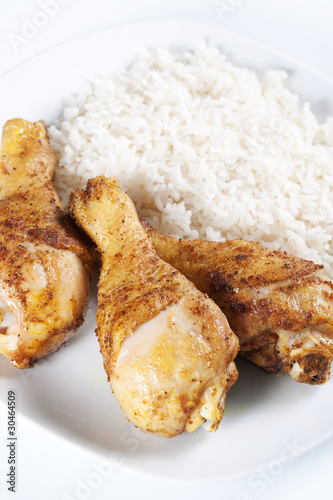 Roasted chicken legs with boiled rice
