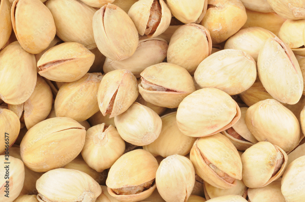 A heap of roasted and salted pistachio nuts