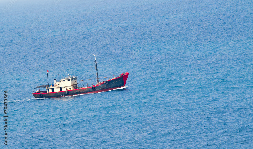 A fish boat starts its daily work