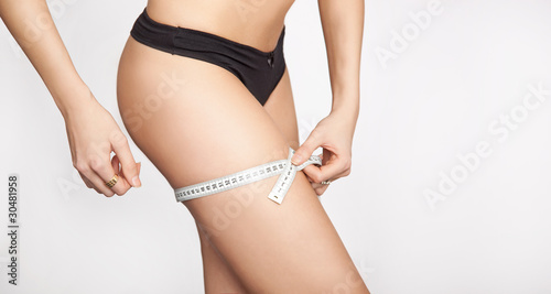 Woman body part is being measured
