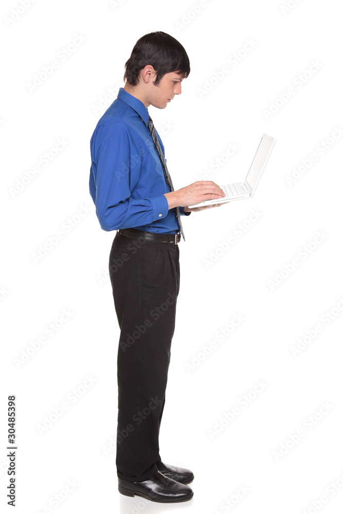 Laptop computer - businessman standing and typing Laptop computer - businessman standing and typing