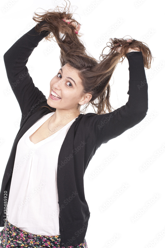 Naklejka premium girl having fun and pulling her long hair