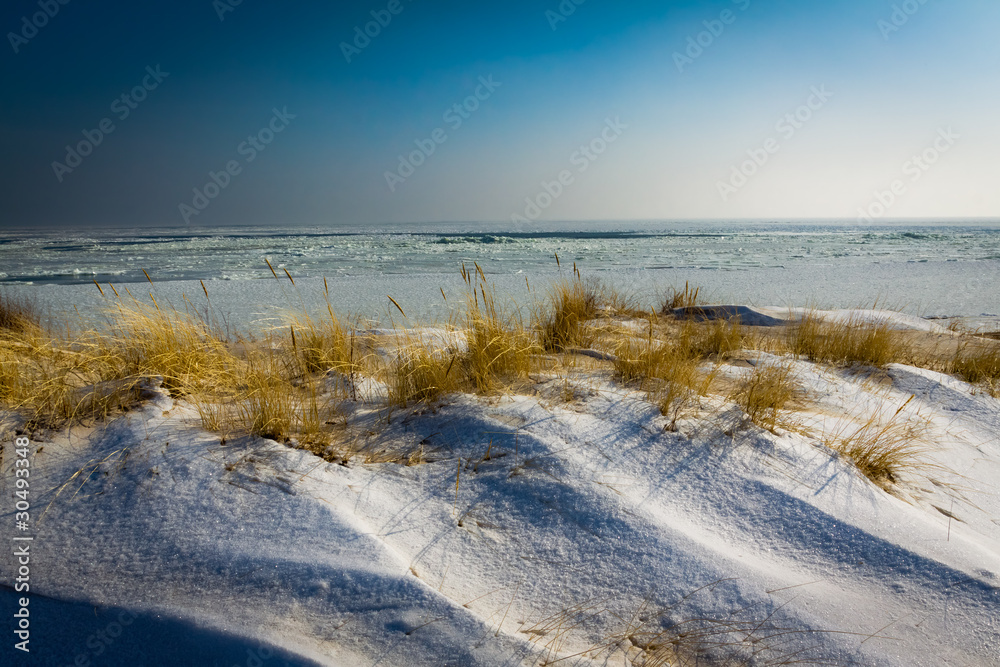 Winter sunrise in frosen beach Winter sunrise in frosen beach