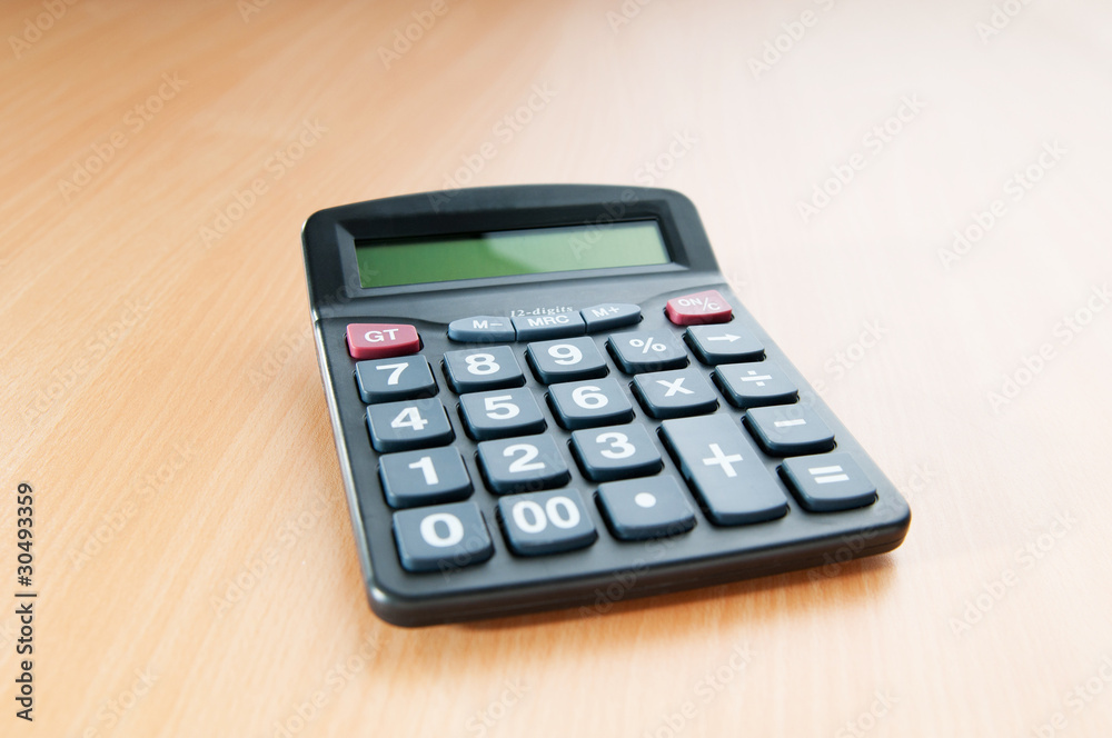 Business concept with accounting calculator Business concept with accounting calculator