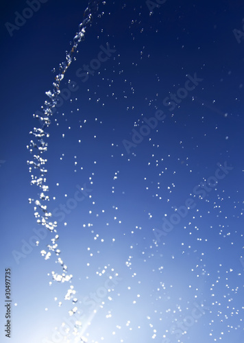 Wallpaper Mural Whater splashed over blue background Torontodigital.ca