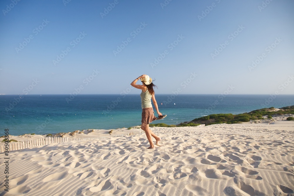woman walking over Atlantic ocean