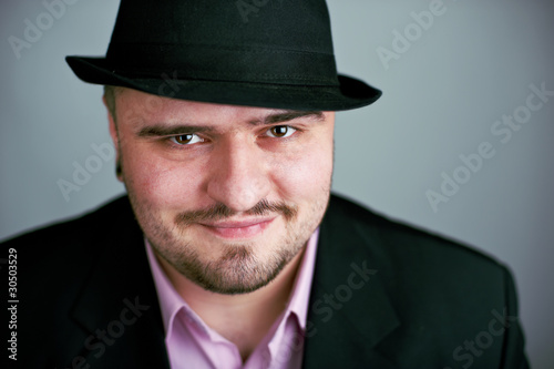 Atrractive man in black hat