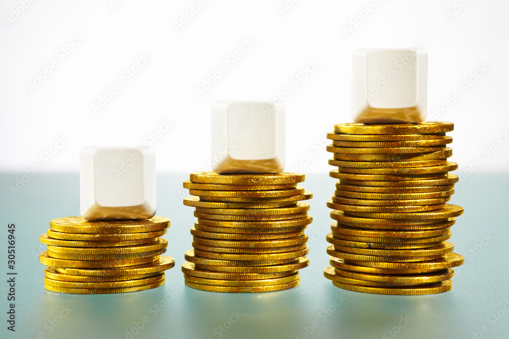 Three blank block over gold coins Three blank block over gold coins