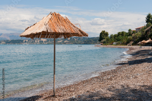 Greek beach with empty bench