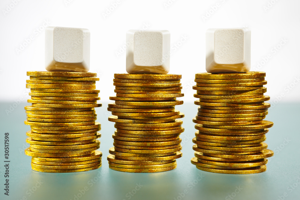 Three blank block over gold coins Three blank block over gold coins