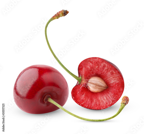 Isolated cherry. Two sweet cherry fruits, one cut in half isolated on white background