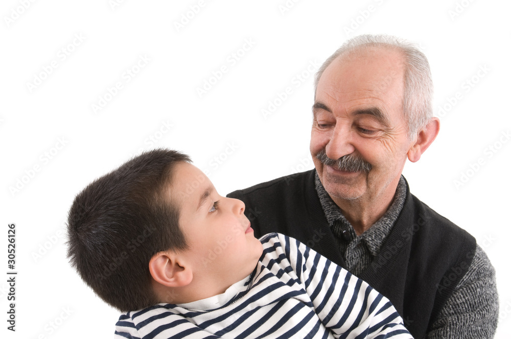 Cute boy with his grandfather isolated on white background.