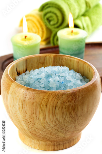 Bath sea salt with candles and towels