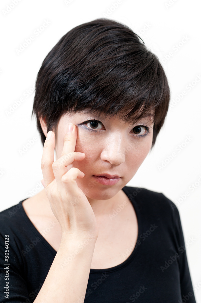 beautiful asian woman taking care of her eye beautiful asian woman taking care of her eye