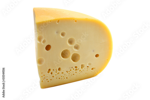 The cheese piece is isolated on a white background
